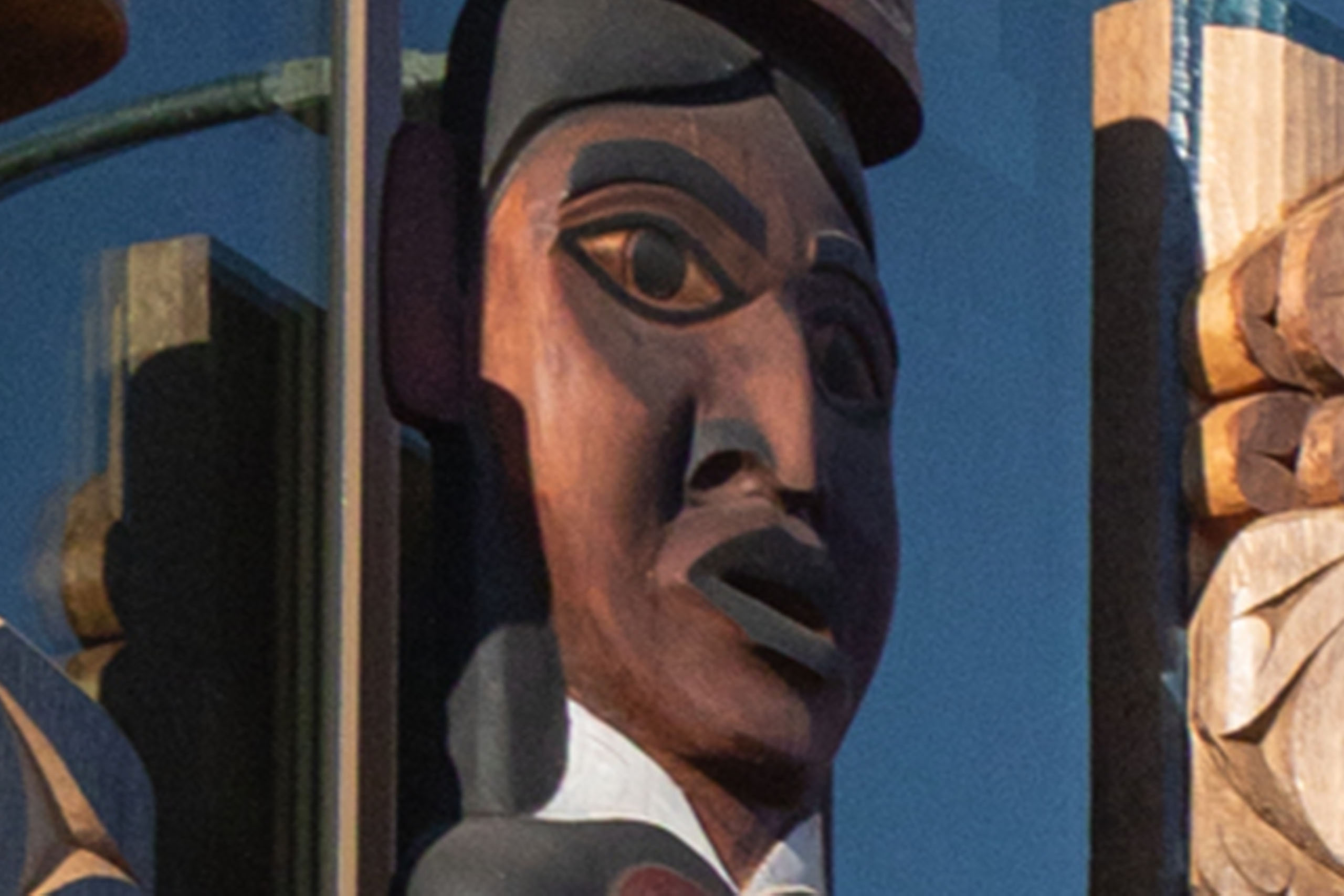A close-up of the house post carved by Elder Floyd Joseph